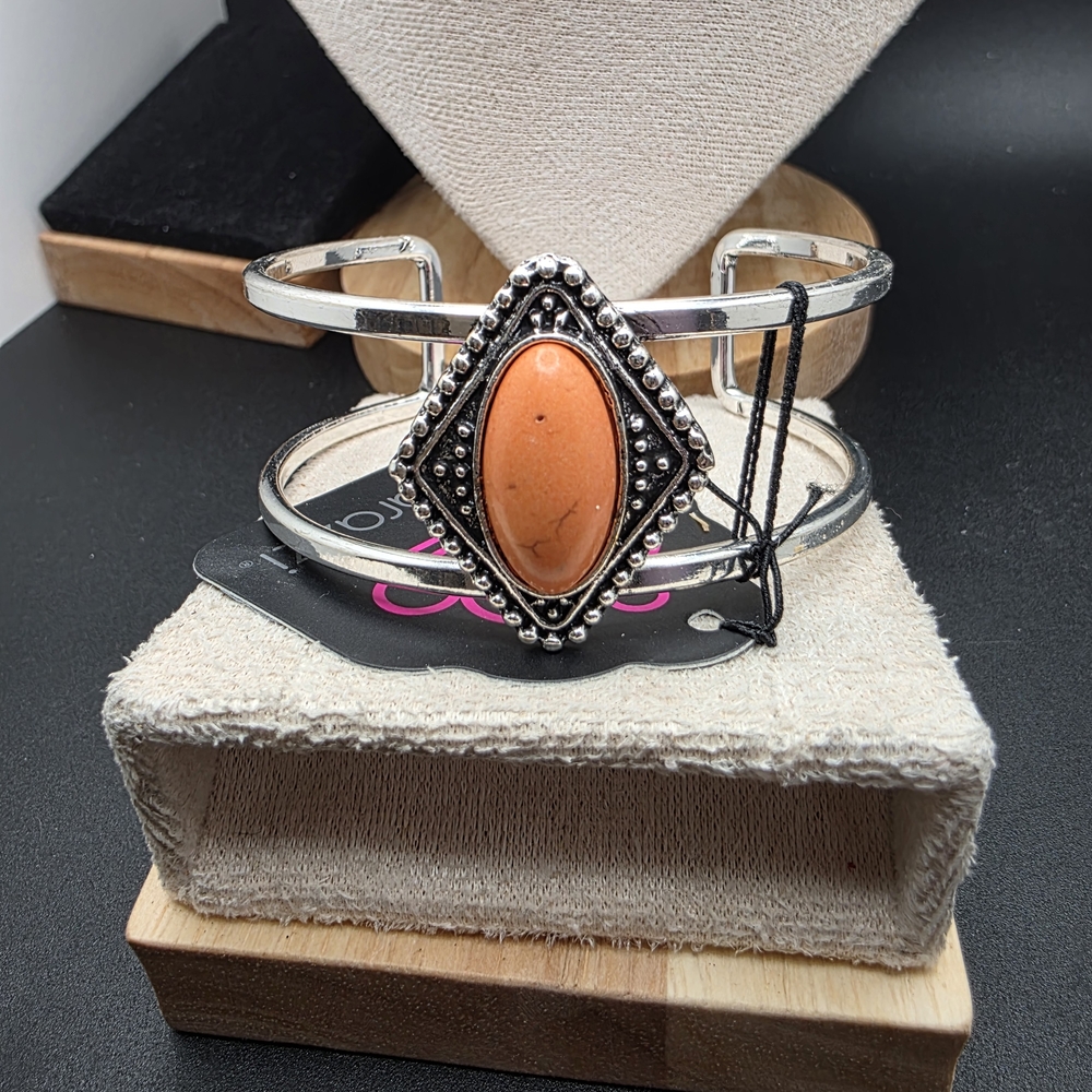 Silver Bracelet with Orange Stone (1952)